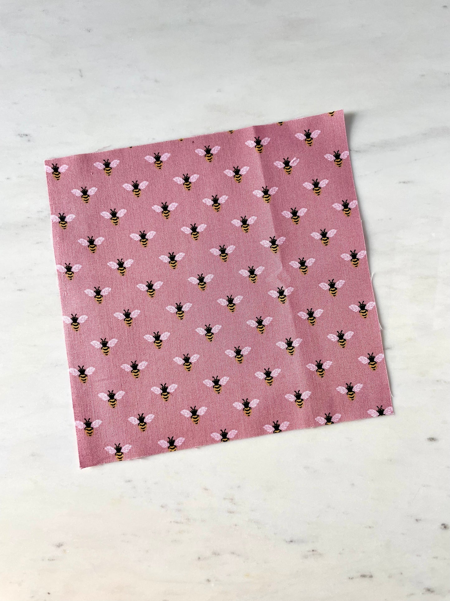 Mauve Bees Finishing Fabric